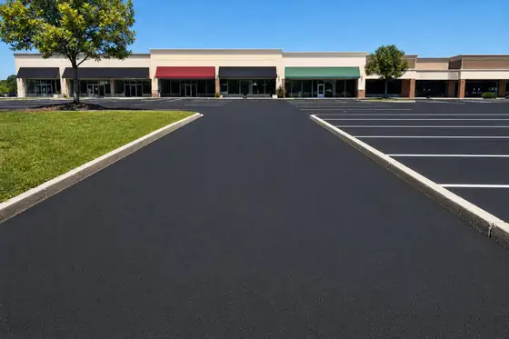 Retail strip center driveway after sealcoating