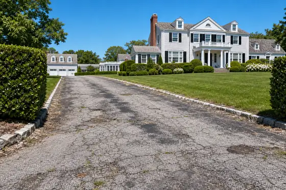 Shingled estate · North Shore driveway before sealcoating