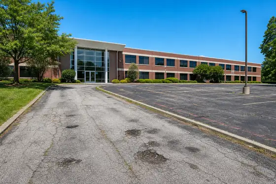 Suburban office building driveway before sealcoating