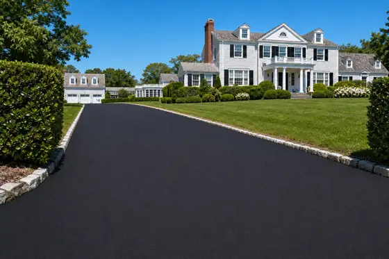 Shingled estate · North Shore driveway after sealcoating
