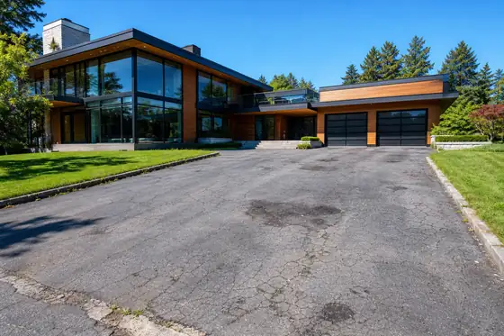 Modern contemporary · wide court driveway before sealcoating